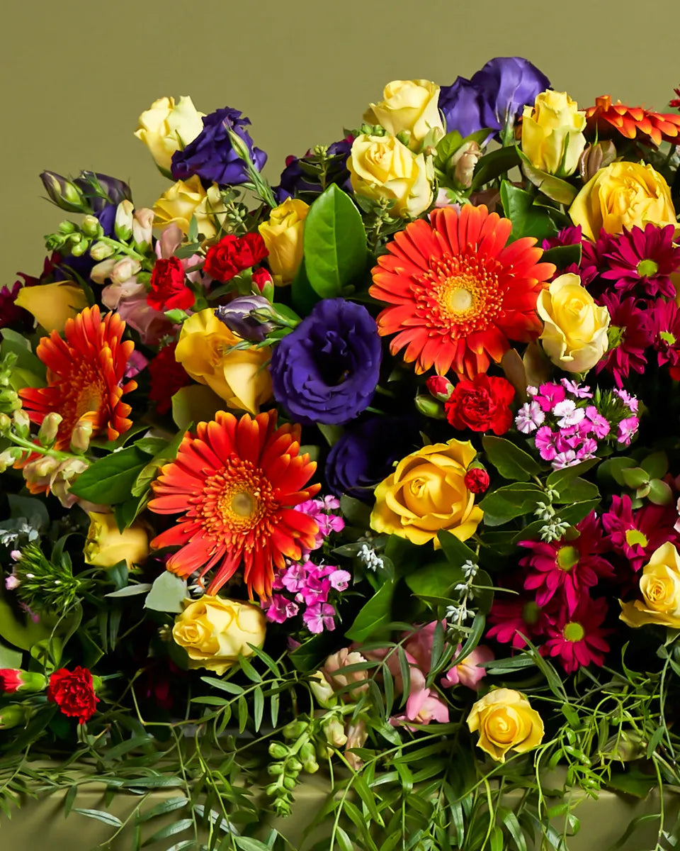 Premium Bright Casket Flower Arrangement