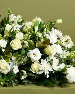 White Casket Flower Arrangement